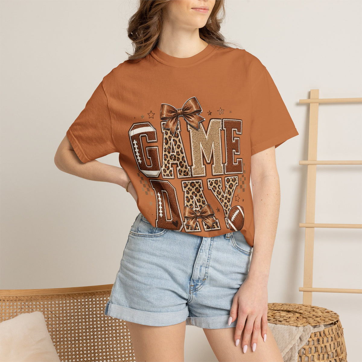 Game Day T‑Shirt — Leopard Print Football Graphic with Bow