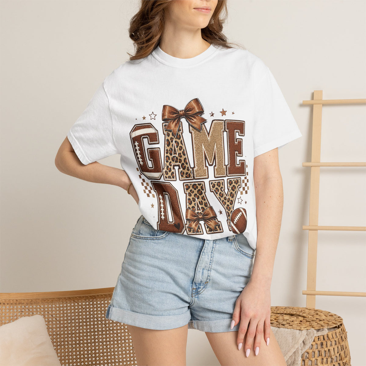 Game Day T‑Shirt — Leopard Print Football Graphic with Bow