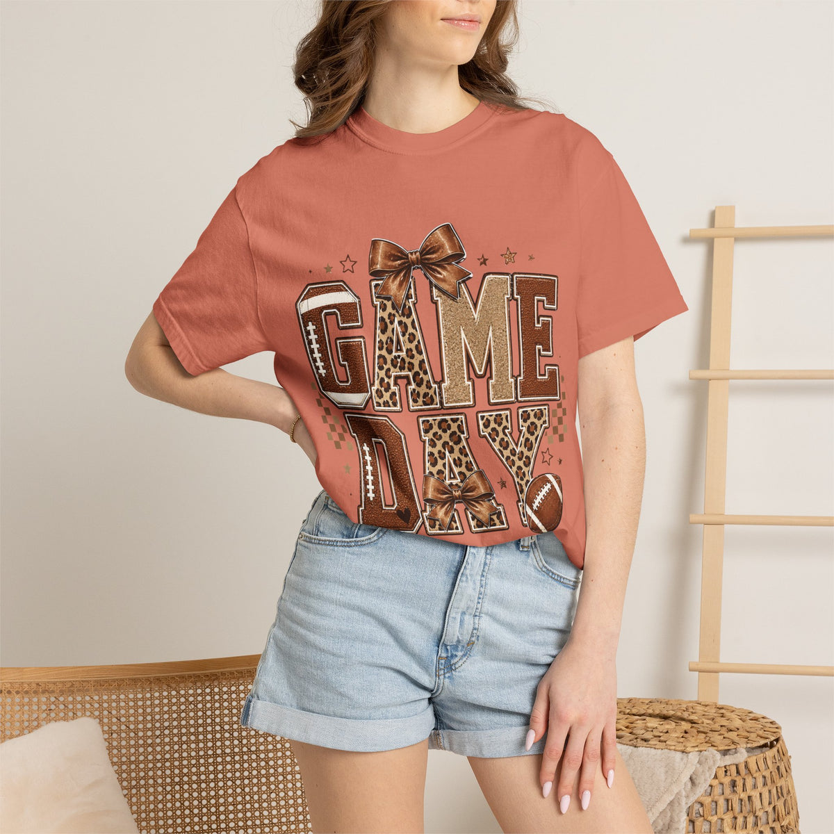 Game Day T‑Shirt — Leopard Print Football Graphic with Bow