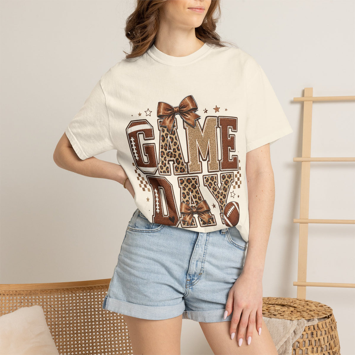 Game Day T‑Shirt — Leopard Print Football Graphic with Bow